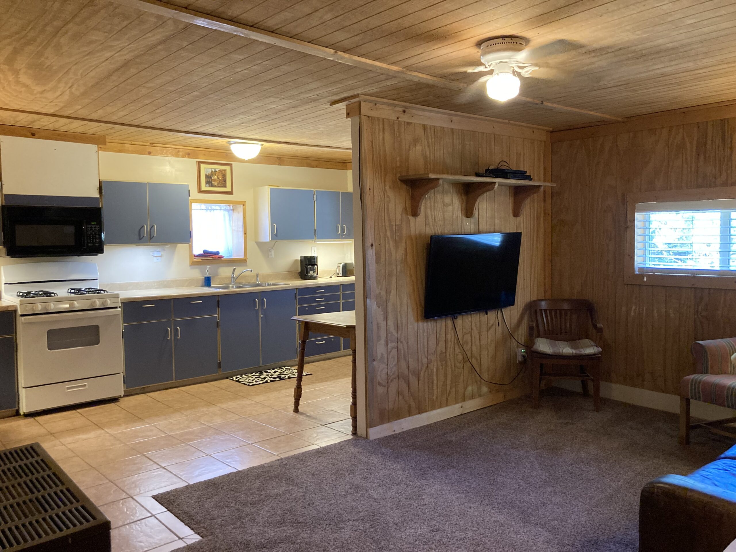Cabin has full kitchen and living room